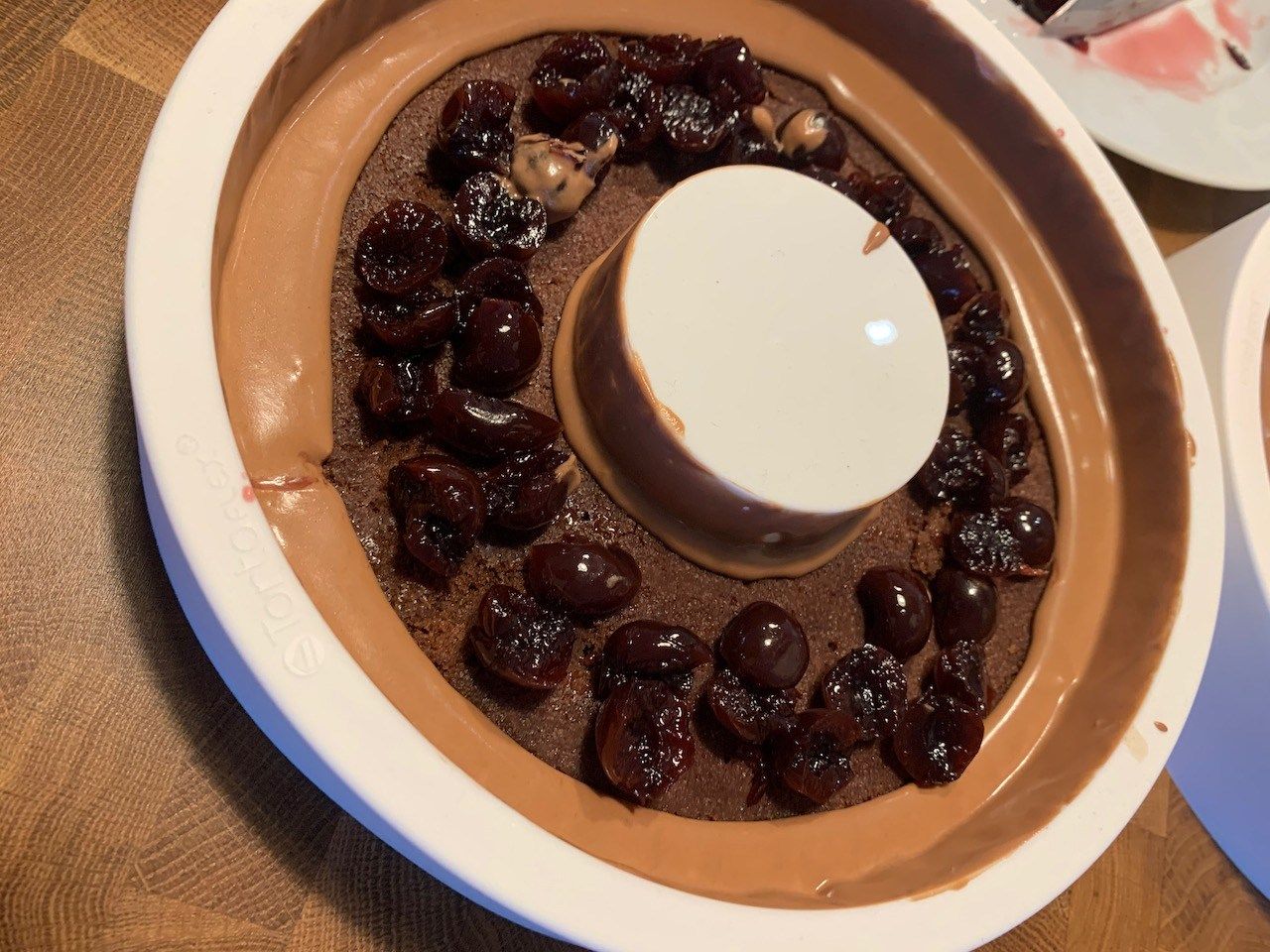 Adding the Amarena cherries to the mold