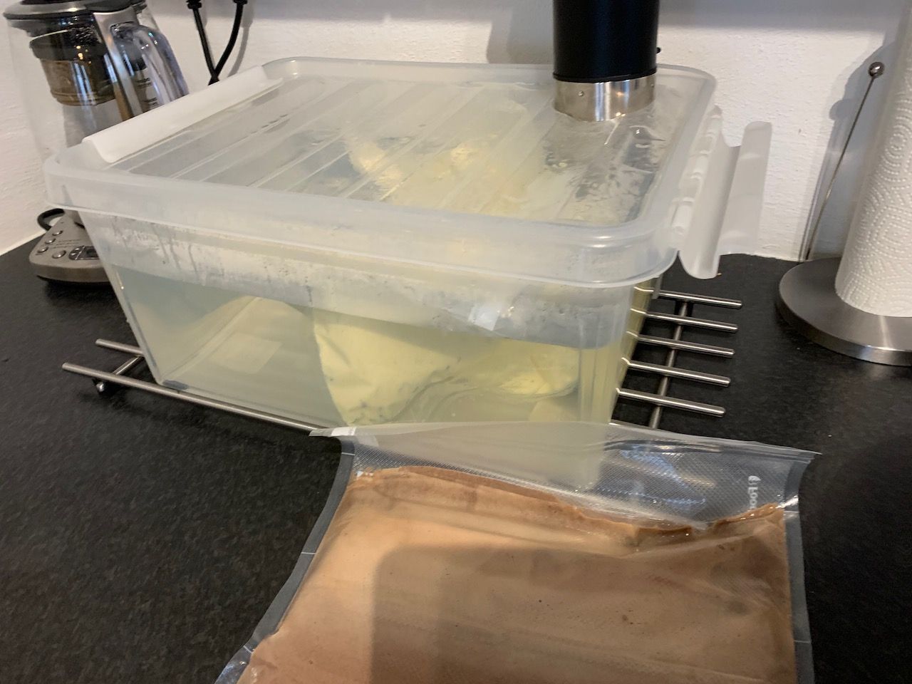 Multiple bags of ice cream mixture in a sous vide container