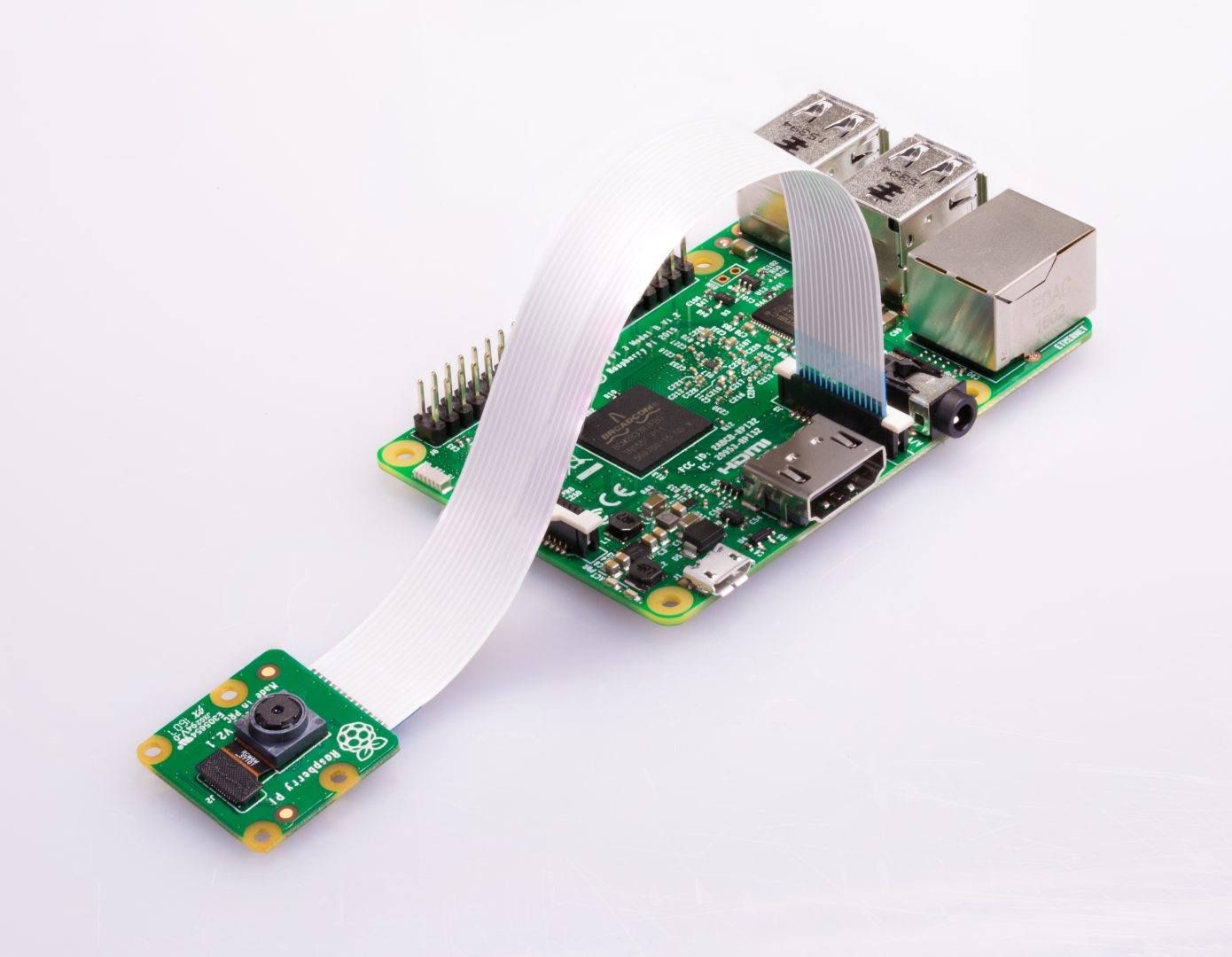 Raspberry Pi with Pi Camera attached.