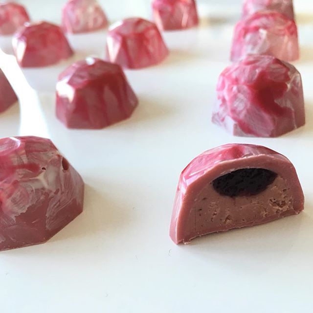 Ruby hazelnut praline with spiced raspberry